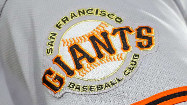 The San Francisco Giants logo on a uniform sleeve.