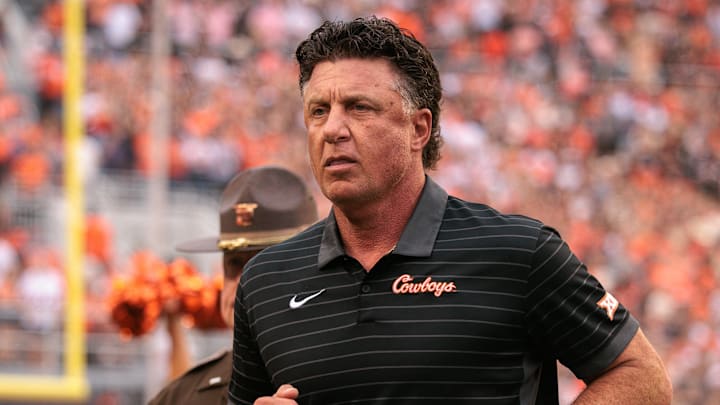 Aug 28, 2025; Stillwater, Oklahoma, USA; Oklahoma State Cowboys coach Mike Gundy takes the field prior to the game against the Tennessee Martin Skyhawks at Boone Pickens Stadium. Mandatory Credit: William Purnell-Imagn Images