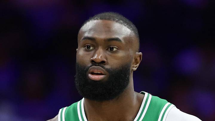 Boston Celtics guard Jaylen Brown dribbles the ball against the Philadelphia 76ers.