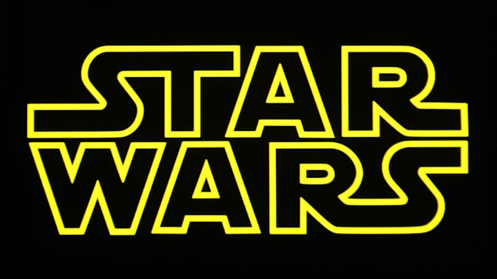 In this photo illustration, a Star Wars logo is seen on a...