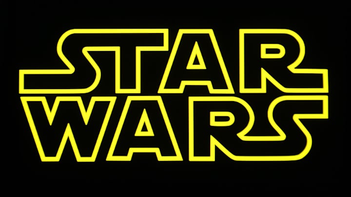 In this photo illustration, a Star Wars logo is seen on a...