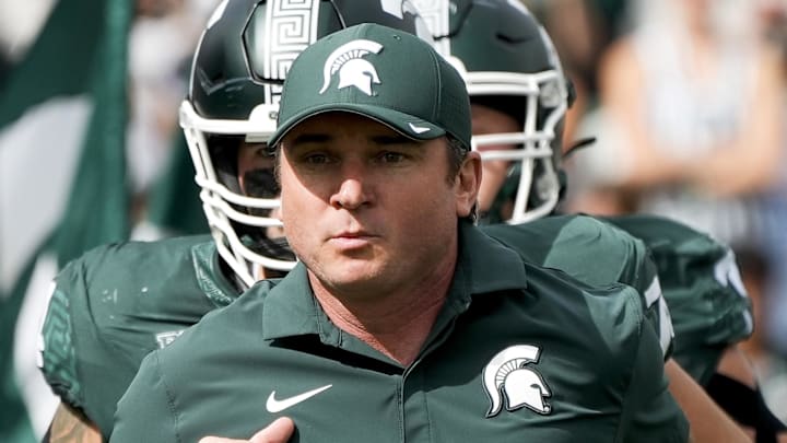 Sep 13, 2025; East Lansing, Michigan, USA; Michigan State head coach Jonathan Smith takes the field before a game against Youngstown State at Spartan Stadium. Mandatory Credit: Brendan Mullin-Imagn Images