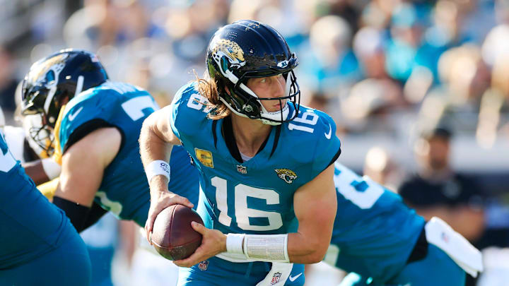 Jacksonville Jaguars quarterback Trevor Lawrence (16) looks to handoff during the third quarter of an NFL football game at EverBank Stadium, Sunday, Nov. 16, 2025 in Jacksonville, Fla. The Jacksonville Jaguars defeated the Los Angeles Chargers 35-6. [Corey Perrine/Florida Times-Union]