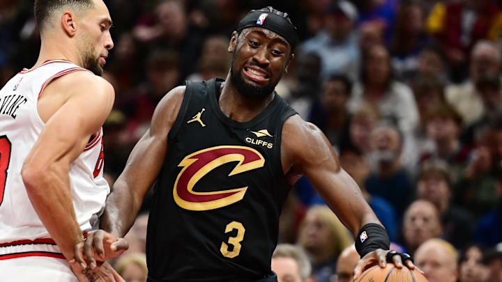Nov 15, 2024; Cleveland, Ohio, USA; Cleveland Cavaliers guard Caris LeVert (3) drives to the basket against Chicago Bulls guard Zach LaVine (8) during the first half at Rocket Mortgage FieldHouse. Mandatory Credit: Ken Blaze-Imagn Images