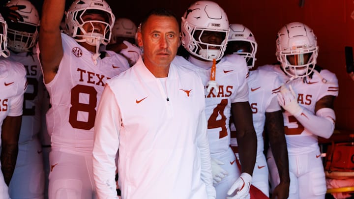 Texas Longhorns head coach Steve Sarkisian leads the team out of the tunnel before a game against the Florida Gators at Ben Hill Griffin Stadium. 