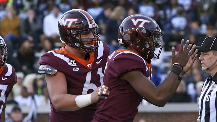 OL Bryan Hudson (61) during his time with Virginia Tech 