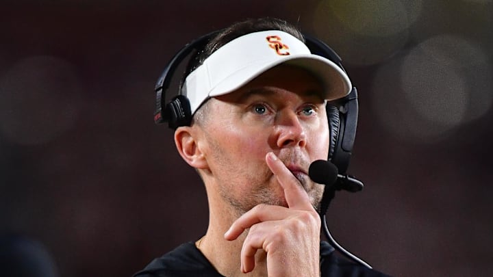 Nov 7, 2025; Los Angeles, California, USA; Southern California Trojans head coach Lincoln Riley watches game action against the Northwestern Wildcats during the second half at the Los Angeles Memorial Coliseum. Nov 7, 2025; Los Angeles, California, USA; Southern California Trojans head coach Lincoln Riley watches game action against the Northwestern Wildcats during the second half at the Los Angeles Memorial Coliseum.