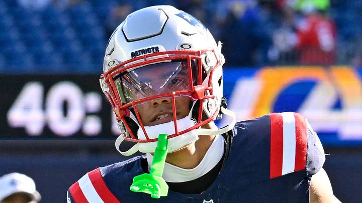 Nov 17, 2024; Foxborough, Massachusetts, USA;  New England Patriots cornerback Christian Gonzalez (0) warms up before a game against the Los Angeles Rams at Gillette Stadium. Mandatory Credit: Eric Canha-Imagn Images