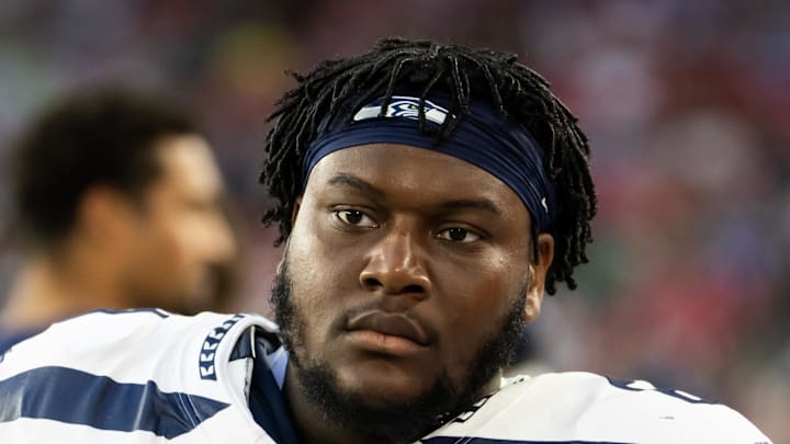 Seattle Seahawks guard Christian Haynes looks on