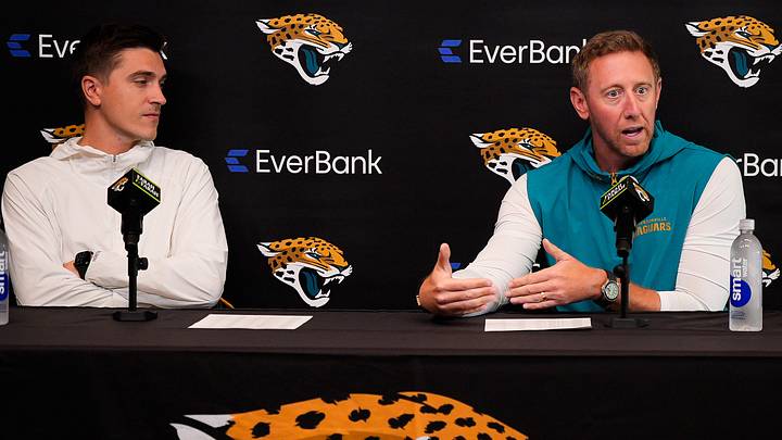 Jaguars General Manager James Gladstone, left listens as head coach Liam Coen talks about the upcoming NFL draft during the Jacksonville Jaguars’ annual pre-draft luncheon press conference in the media room at the Miller Electric Center Thursday April 9, 2026 in Jacksonville, Fla. [Doug Engle/Florida Times-Union]