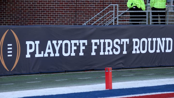 Dec 20, 2025; Oxford, MS, USA; College Football First Round logo on field prior to the game between the Tulane Green Wave and  the Mississippi Rebels at Vaught-Hemingway Stadium. Mandatory Credit: Petre Thomas-Imagn Images