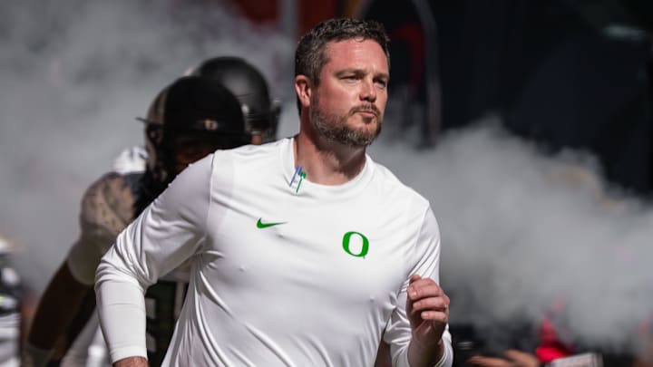 Oregon Ducks College Football Dan Lanning transfer portal gm nil dante moore koi perich lsu tigers lane kiffin spend