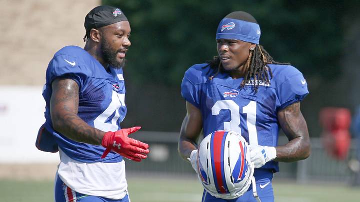 Bills veteran defensive back Christian Benford talks with rookie Maxwell Hairston between drills during day five of Buffalo Bills training camp.