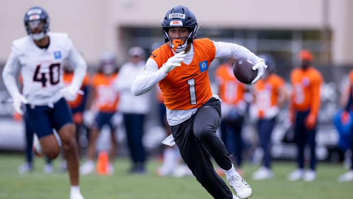 Denver Broncos tight end Evan Engram (1) runs a route during an OTA practice at Broncos Park Powered by CommonSpirit.