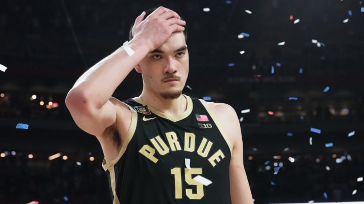 A dejected Purdue Boilermakers center Zach Edey (15) walks off the court after losing the Men's NCAA national championship game to Connecticut Huskies at State Farm Stadium in Glendale on April 8, 2024.