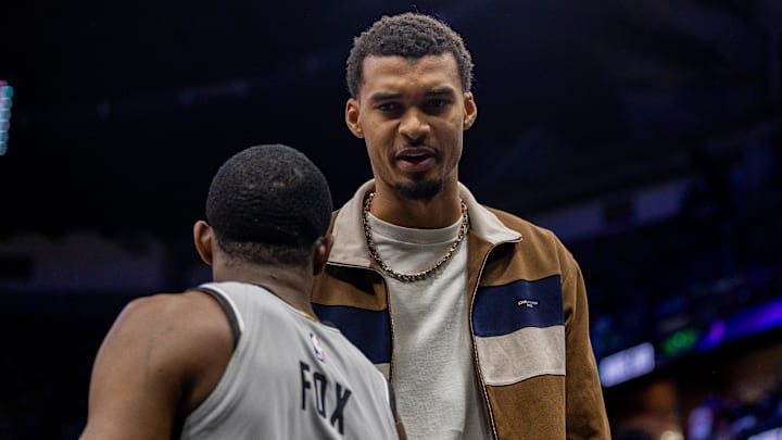 Dec 8, 2025; New Orleans, Louisiana, USA; San Antonio Spurs guard De'Aaron Fox (4) and forward Victor Wembanyama (1) share a moment against the New Orleans Pelicans during the second half at Smoothie King Center. Dec 8, 2025; New Orleans, Louisiana, USA; San Antonio Spurs guard De'Aaron Fox (4) and forward Victor Wembanyama (1) share a moment against the New Orleans Pelicans during the second half at Smoothie King Center.
