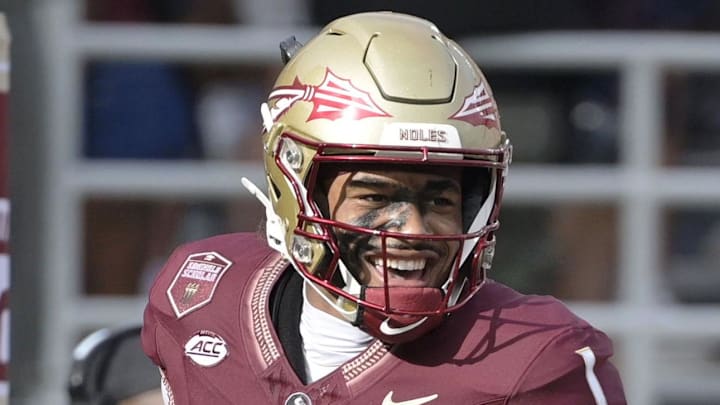 Aug 30, 2025; Tallahassee, Florida, USA; Florida State Seminoles quarterback Tommy Castellanos (1) celebrates with wide receiver Micahi Danzy (19) after a touchdown against the Alabama Crimson Tide during the second half at Doak S. Campbell Stadium. Mandatory Credit: Melina Myers-Imagn Images