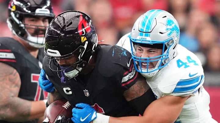 Detroit Lions linebacker Malcolm Rodriguez (44) tackles Arizona Cardinals running back James Conner (6)