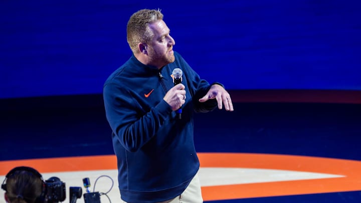 Newly hired Auburn football head coach Alex Golesh talks to fans as Auburn Tigers take on NC State Wolfpack at Neville Arena in Auburn, Ala. on Wednesday, Dec. 3, 2025. Auburn Tigers lead NC State Wolfpack 41-35 at halftime.