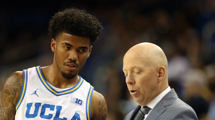Nov 3, 2025; Los Angeles, California, USA;  UCLA Bruins head coach Mick Cronin talks to guard Donovan Dent (2) during the second half against the Eastern Washington Eagles at Pauley Pavilion presented by Wescom Financial. Mandatory Credit: Kiyoshi Mio-Imagn Images