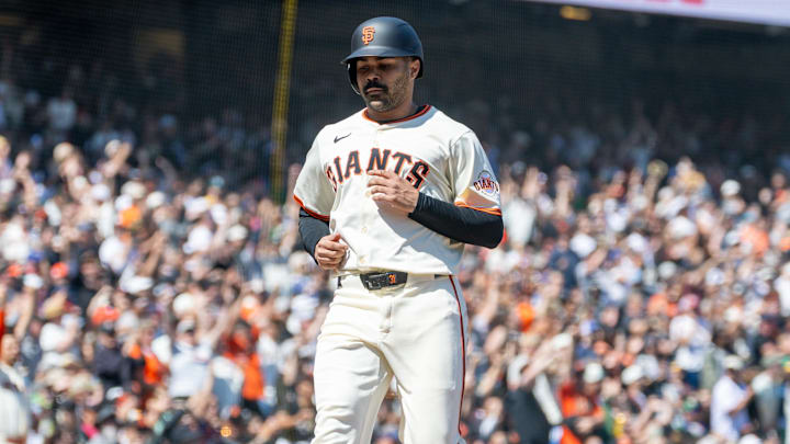 May 18, 2025; San Francisco, California, USA; San Francisco Giants first base LaMonte Wade Jr. (31) comes home after a single by San Francisco Giants catcher Patrick Bailey (14) during the eighth inning against the Oakland Athletics at Oracle Park. 