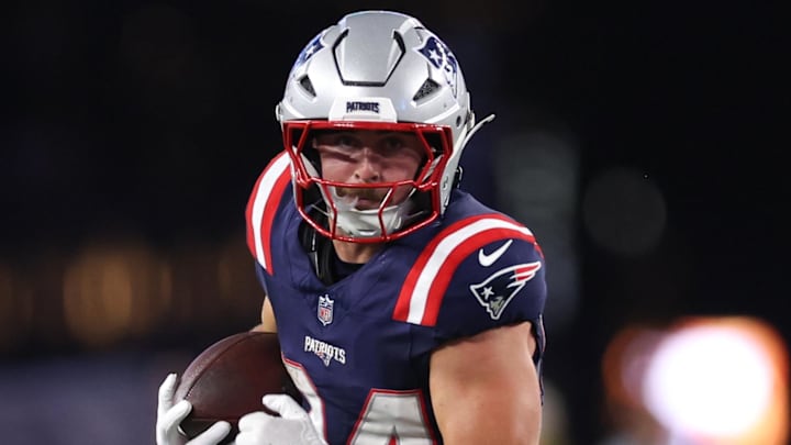 Aug 8, 2025; Foxborough, Massachusetts, USA; New England Patriots running back Lan Larison (34) runs the ball during the second half against the Washington Commanders at Gillette Stadium. Mandatory Credit: Paul Rutherford-Imagn Images Aug 8, 2025; Foxborough, Massachusetts, USA; New England Patriots running back Lan Larison (34) runs the ball during the second half against the Washington Commanders at Gillette Stadium. Mandatory Credit: Paul Rutherford-Imagn Images