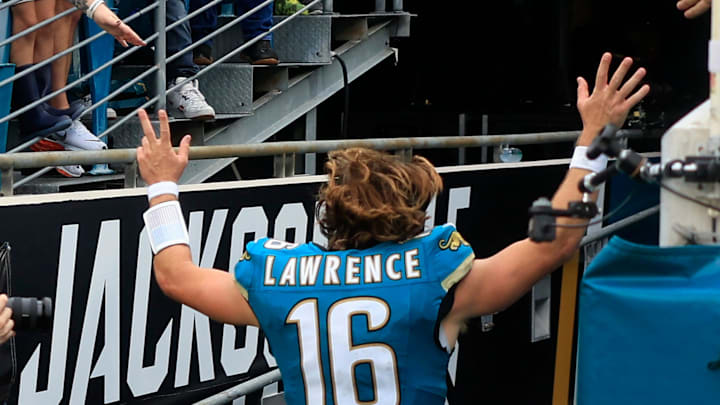 Jacksonville Jaguars quarterback Trevor Lawrence (16) runs off the field after an NFL football matchup Sunday, Oct. 6, 2024 at EverBank Stadium in Jacksonville, Fla. The Jaguars edged the Colts on a field goal 37-34. [Corey Perrine/Florida Times-Union]