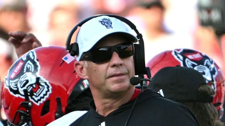 Sep 20, 2025; Durham, North Carolina, USA;  NC State Wolfpack head coach Dave Doeren during the second quarter against the Duke Blue Devils at Wallace Wade Stadium. Mandatory Credit: Zachary Taft-Imagn Images