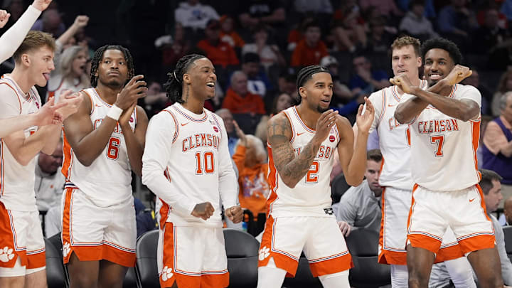 Mar 13, 2025; Charlotte, NC, USA; Clemson Tigers bench applauds a play during the first half against the Southern Methodist Mustangs at Spectrum Center.
