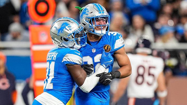 Detroit Lions safety Kerby Joseph (31), left, and safety Brian Branch (32) celebrate a play against Chicago Bears Detroit Lions safety Kerby Joseph (31), left, and safety Brian Branch (32) celebrate a play against Chicago Bears