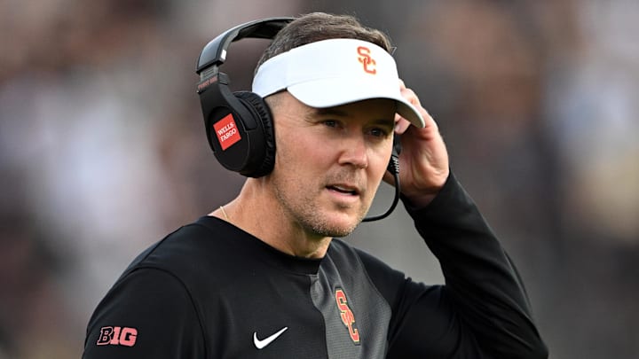 Sep 13, 2025; West Lafayette, Indiana, USA; Southern California Trojans head coach Lincoln Riley stands on the sidelines during the first quarter against the Purdue Boilermakers at Ross-Ade Stadium. Mandatory Credit: Marc Lebryk-Imagn Images