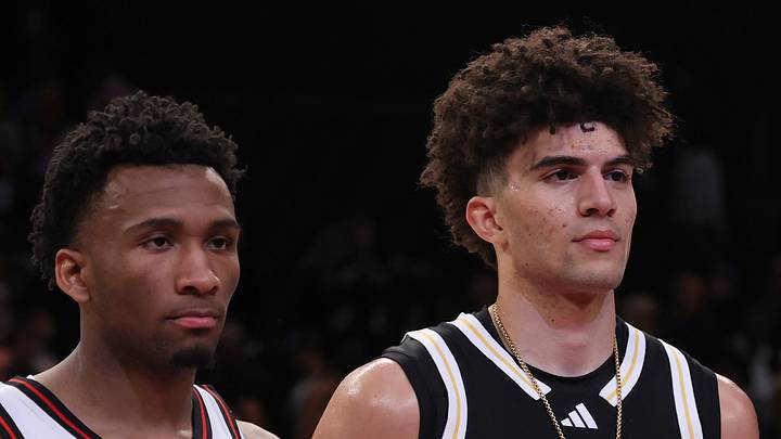 Apr 1, 2025; Brooklyn, NY, USA; McDonald's All American West guard Darryn Peterson (22) and McDonald's All American East forward Cameron Boozer (12) pose for photos after the game at Barclays Center. Mandatory Credit: Pamela Smith-Imagn Imagess