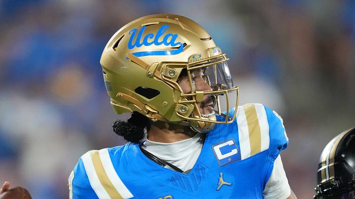 Sep 19, 2026; Pasadena, California, USA; UCLA Bruins quarterback Nico Iamaleava (9) throws the ball against Purdue Boilermakers defensive end Keyshawn Burgos (11) in the second half at the Rose Bowl. Mandatory Credit: Kirby Lee-Imagn Images Sep 19, 2026; Pasadena, California, USA; UCLA Bruins quarterback Nico Iamaleava (9) throws the ball against Purdue Boilermakers defensive end Keyshawn Burgos (11) in the second half at the Rose Bowl. Mandatory Credit: Kirby Lee-Imagn Images