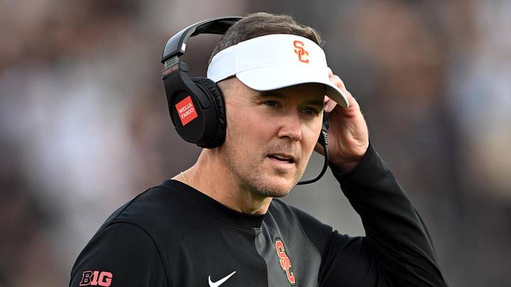Sep 13, 2025; West Lafayette, Indiana, USA; Southern California Trojans head coach Lincoln Riley stands on the sidelines during the first quarter against the Purdue Boilermakers at Ross-Ade Stadium. Mandatory Credit: Marc Lebryk-Imagn Images Sep 13, 2025; West Lafayette, Indiana, USA; Southern California Trojans head coach Lincoln Riley stands on the sidelines during the first quarter against the Purdue Boilermakers at Ross-Ade Stadium. Mandatory Credit: Marc Lebryk-Imagn Images