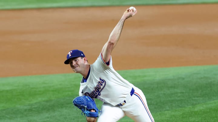 Texas Rangers starting pitcher Cody Bradford throws a baseball.