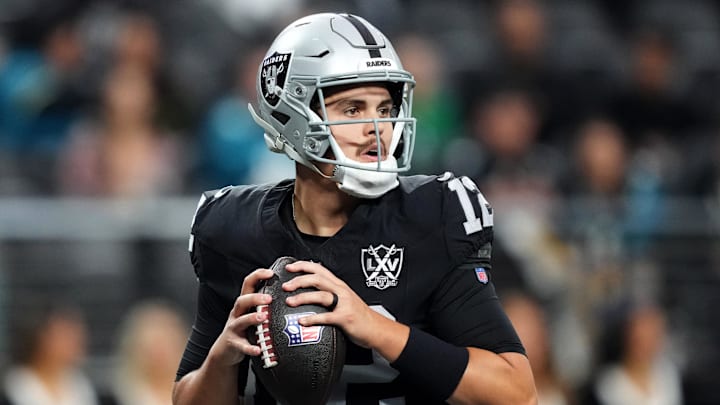 Dec 22, 2024; Paradise, Nevada, USA; Las Vegas Raiders quarterback Aidan O'Connell (12) throws against the Jacksonville Jaguars in the first half at Allegiant Stadium. Mandatory Credit: Kirby Lee-Imagn Images Dec 22, 2024; Paradise, Nevada, USA; Las Vegas Raiders quarterback Aidan O'Connell (12) throws against the Jacksonville Jaguars in the first half at Allegiant Stadium. Mandatory Credit: Kirby Lee-Imagn Images