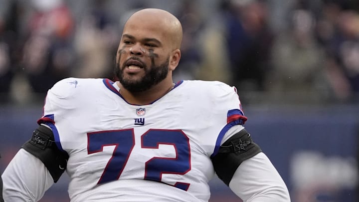 Nov 9, 2025; Chicago, Illinois, USA; New York Giants offensive tackle Jermaine Eluemunor (72) leaves the field after losing to the Chicago Bears at Soldier Field. Mandatory Credit: David Banks-Imagn Images