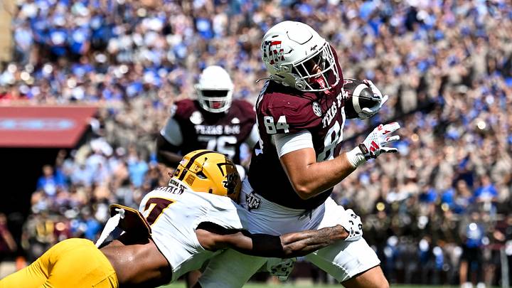 Sep 12, 2026; College Station, Texas, USA; Texas A&M Aggies tight end Richie Anderson III (84) runs the ball as Arizona State Sun Devils defensive back Montana Warren (7) makes a tackle during the second quarter at Kyle Field. Mandatory Credit: Maria Lysaker-Imagn Images Sep 12, 2026; College Station, Texas, USA; Texas A&M Aggies tight end Richie Anderson III (84) runs the ball as Arizona State Sun Devils defensive back Montana Warren (7) makes a tackle during the second quarter at Kyle Field. Mandatory Credit: Maria Lysaker-Imagn Images