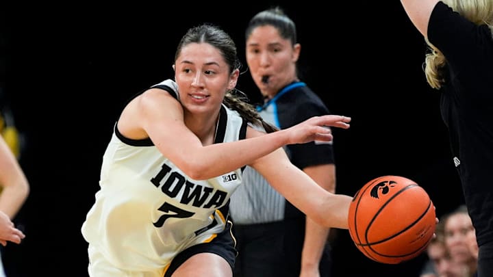 Iowa guard Addie Deal (7) tries to save the ball from going out of bounds against the Evansville Purple Aces Nov. 9, 2025 during a women’s basketball game at Carver-Hawkeye Arena in Iowa City, Iowa.