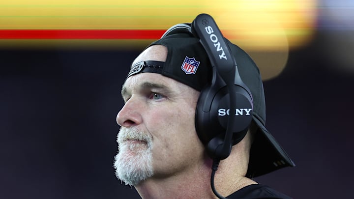 Washington Commanders head coach Dan Quinn reacts during the first half against the New England Patriots.