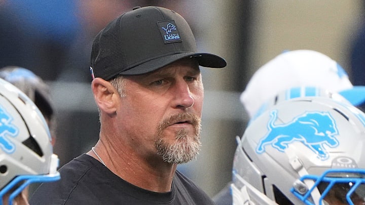 Detroit Lions head coach Dan Campbell works with his team in pre-game at the Pro Football Hall of Fame game