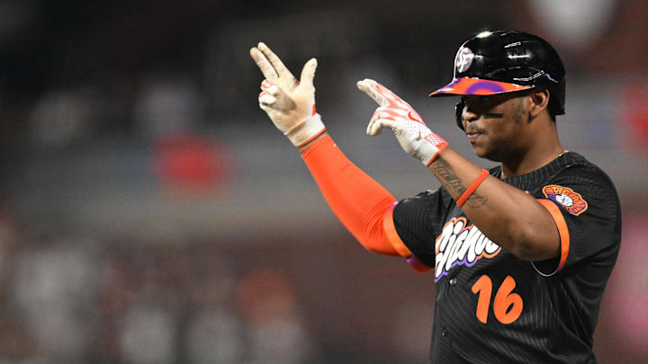 San Francisco Giants first baseman Rafael Devers (16) celebrates a single against the St. Louis Cardinals during the fourth inning at Oracle Park.