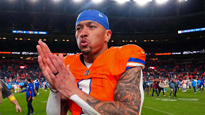 Jan 4, 2026; Denver, Colorado, USA; Denver Broncos tight end Evan Engram (1) looks on after winning the game against the Los Angeles Chargers at Empower Field at Mile High. 