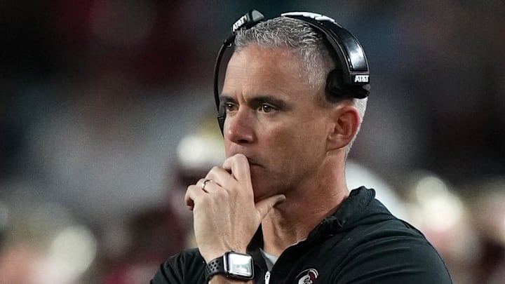 Dec 30, 2023; Miami Gardens, FL, USA; Florida State Seminoles head coach Mike Norvell reacts against the Georgia Bulldogs during the second half in the 2023 Orange Bowl at Hard Rock Stadium. Mandatory Credit: Jasen Vinlove-Imagn Images