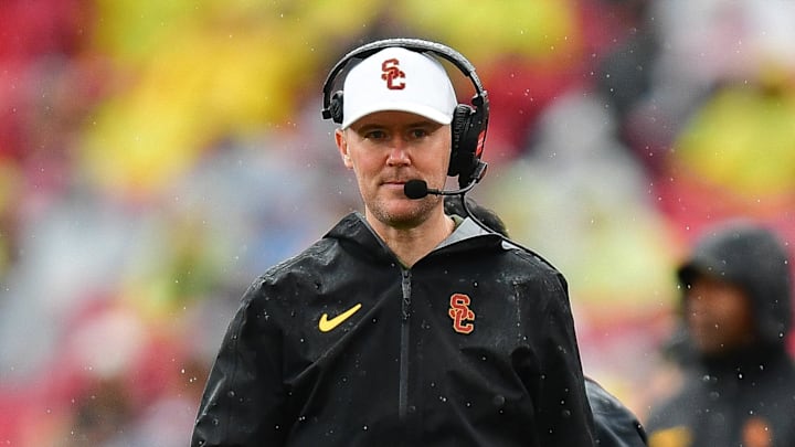 Nov 15, 2025; Los Angeles, California, USA; Southern California Trojans head coach Lincoln Riley watches game action against the Iowa Hawkeyes during the first half at the Los Angeles Memorial Coliseum. Mandatory Credit: Gary A. Vasquez-Imagn Images