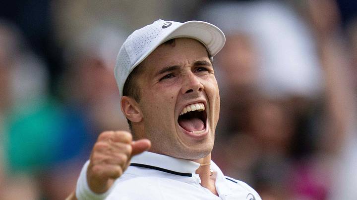 Arthur Fery reacts to winning a Wimbledon match
