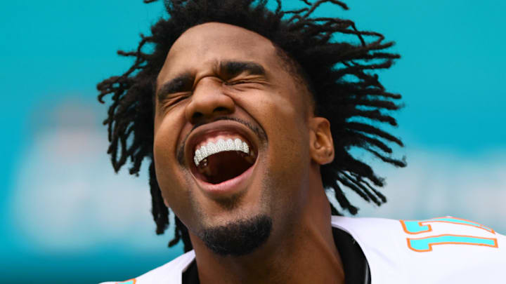 Oct 27, 2024; Miami Gardens, Florida, USA; Miami Dolphins wide receiver Jaylen Waddle (17) reacts as he enters the field before the game against the Arizona Cardinals at Hard Rock Stadium. Mandatory Credit: Sam Navarro-Imagn Images