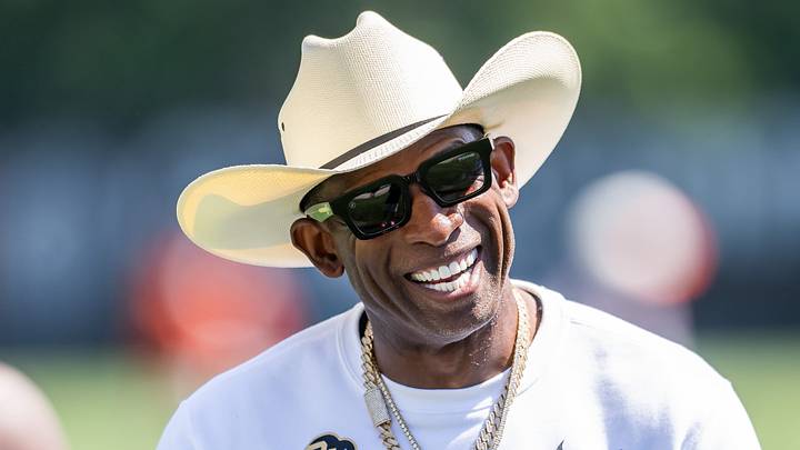 Jul 30, 2026; Berea, OH, USA; Cleveland Browns quarterback Shedeur Sanders (2) talks with his father Deion Sanders during training camp at CrossCountry Mortgage Campus. Mandatory Credit: Ken Blaze-Imagn Images Jul 30, 2026; Berea, OH, USA; Cleveland Browns quarterback Shedeur Sanders (2) talks with his father Deion Sanders during training camp at CrossCountry Mortgage Campus. Mandatory Credit: Ken Blaze-Imagn Images