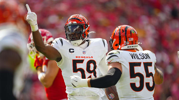 Sep 15, 2024; Kansas City, Missouri, USA; Cincinnati Bengals linebacker Akeem Davis-Gaither (59) celebrates after an interception during the first half against the Kansas City Chiefs at GEHA Field at Arrowhead Stadium. Mandatory Credit: Jay Biggerstaff-Imagn Images Sep 15, 2024; Kansas City, Missouri, USA; Cincinnati Bengals linebacker Akeem Davis-Gaither (59) celebrates after an interception during the first half against the Kansas City Chiefs at GEHA Field at Arrowhead Stadium. Mandatory Credit: Jay Biggerstaff-Imagn Images