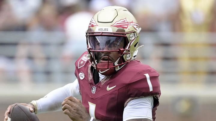 Aug 30, 2025; Tallahassee, Florida, USA; Florida State Seminoles quarterback Tommy Castellanos (1) runs with the ball against the Alabama Crimson Tide during the second half at Doak S. Campbell Stadium. Mandatory Credit: Melina Myers-Imagn Images
